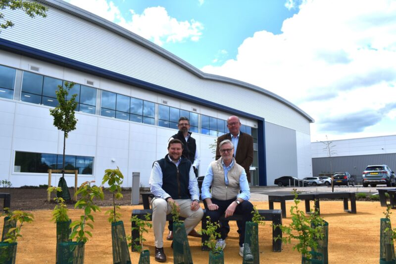 Widem Logistics has agreed a 15-year lease on the 92,246 sq ft Grade A warehouse, known as Barberry Midbox 92, in Warwick. Pictured (from left, front row) Jonathan Robinson of Barberry, Russell Green of Widem Logistics, with (back, from left) Christian Smith of Savills and Bill Wareing of Wareing and Co.